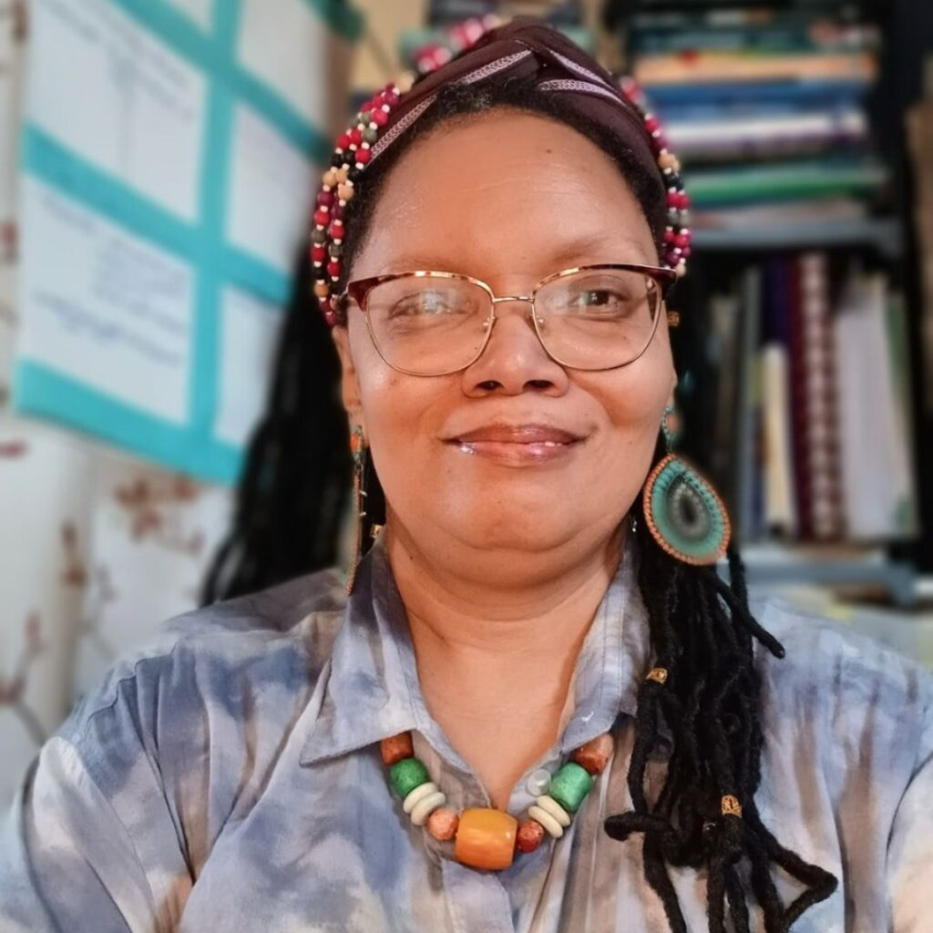 photo of Janeane Davis with locs