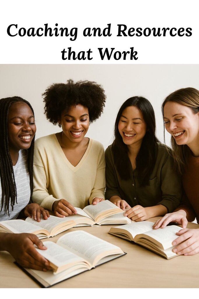 four smiling women looking at books and smiling